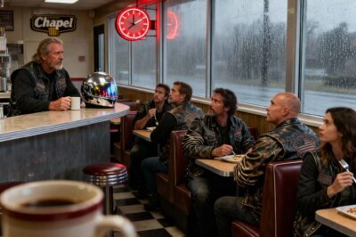 A girl, drenched in rain and injustice, walked into a diner and whispered her shattered dream to a room of fifty outcasts. They didn’t just listen; they decided to answer the storm with a thunder of their own.