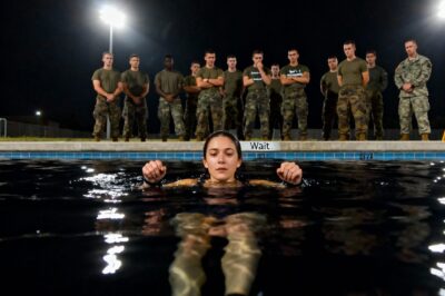 They called him a legend, a SEAL Commander who built warriors by breaking men. When I showed up, he laughed in my face. “This isn’t yoga class, ma’am.” He ordered me, bound hand and foot, into the pool to drown. He had no idea I was a senior operator from SEAL Team 6. And I wasn’t there to train. I was there to hunt. I was there to stop him.